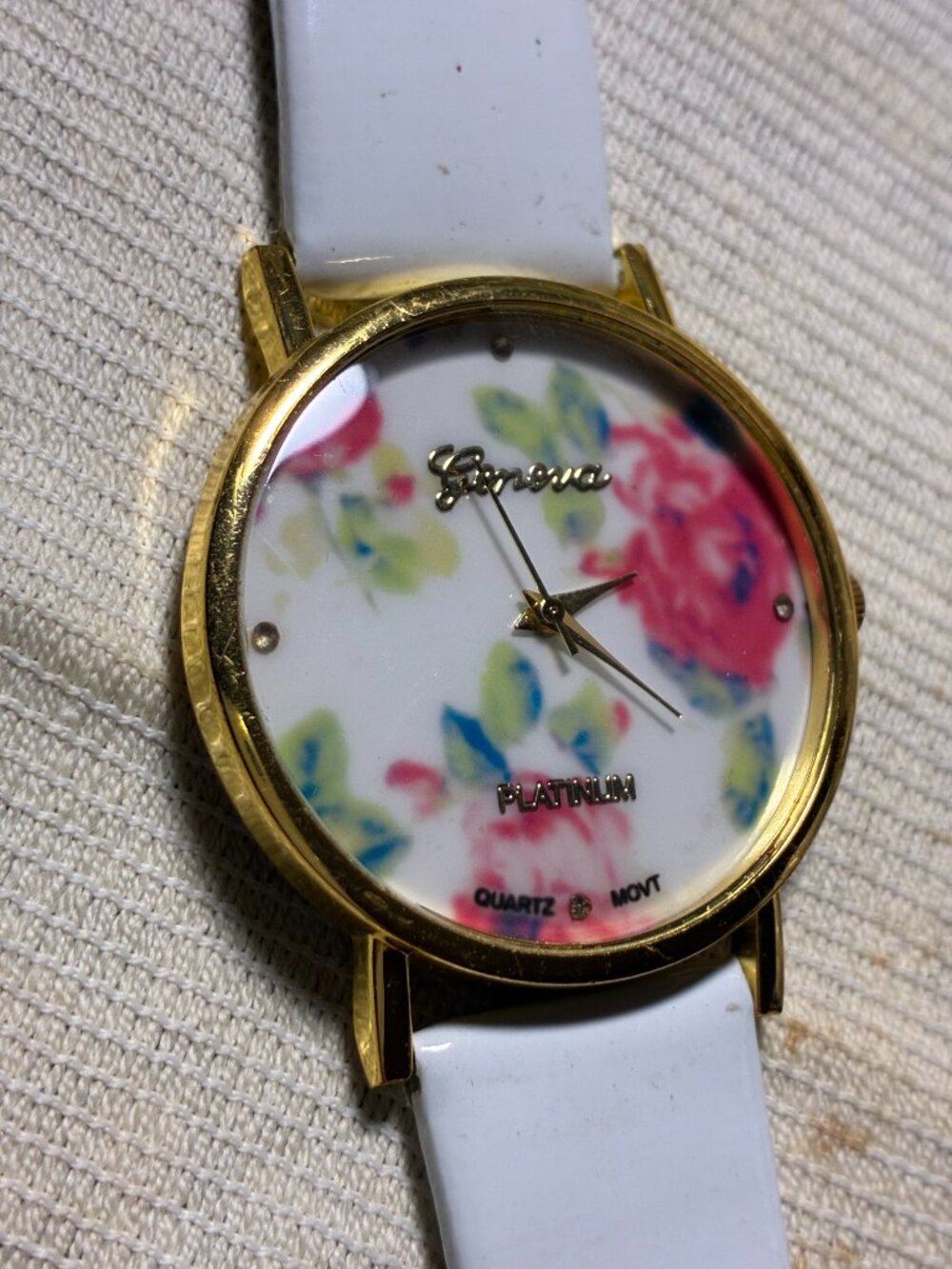 Woman's Geneva White Faux Leather Strap Flower Face Watch